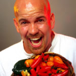 Boulder Hot Sauce, bald man sweating, spicy peppers